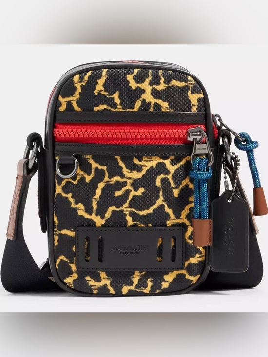 Coach Handbags - Coach Terrain Crossbody
With Wavy Animal Print